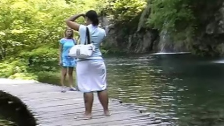 Stunning German lesbians pleasing their pussies on the beach