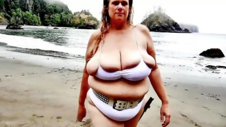 Huge tits BBW beauty emerges from the sea