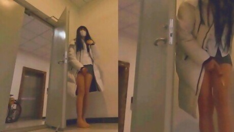 Chinese ladyboy ejaculates in the corridor while listening to the sound of the elevator