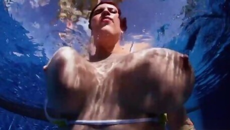 Lovely doll with huge boobs Lana Ivans undressed underwater